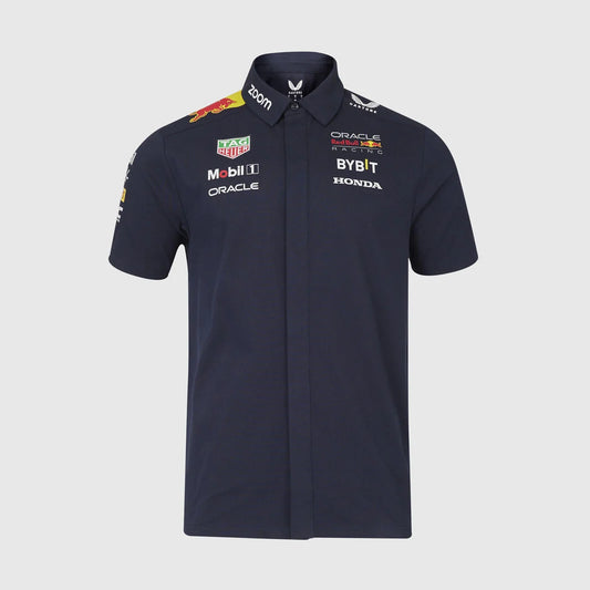A navy blue short-sleeve collared shirt with sponsor logos including Oracle, Honda, Bybit, Mobil 1, and TAG Heuer, displayed on a light gray background.