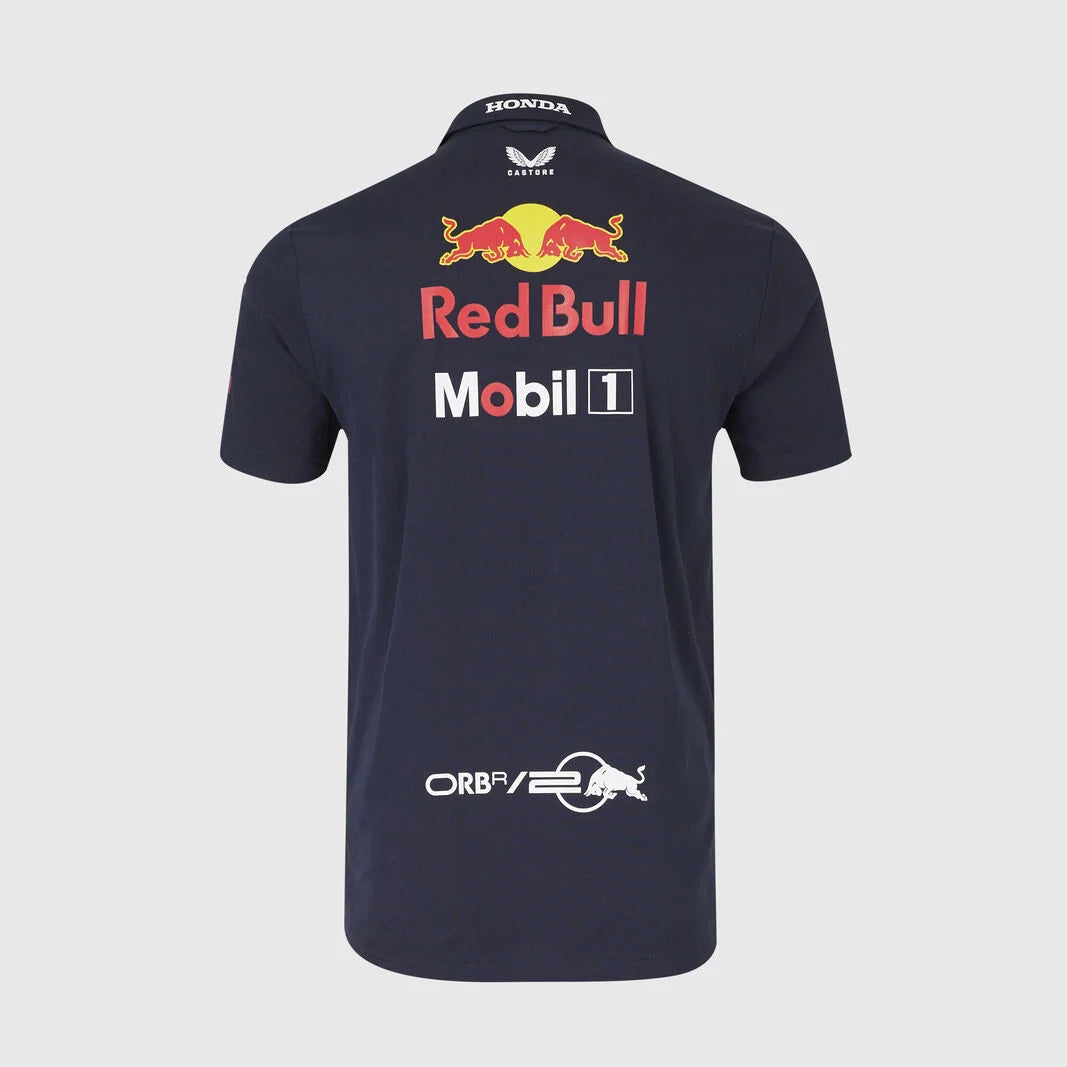 A dark navy blue short-sleeve polo shirt shown from the back, featuring Red Bull Racing and Mobil 1 sponsor logos on the back, with Honda branding on the collar.