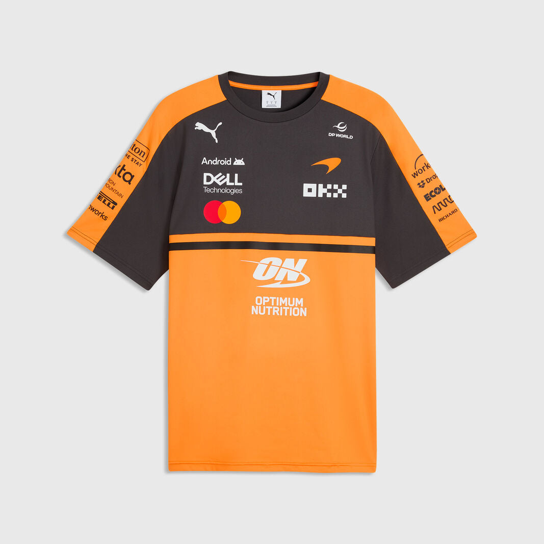 Orange and black sports jersey with various brand logos on a light gray background