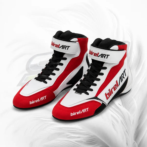 Red and white racing boots with black accents on a white background