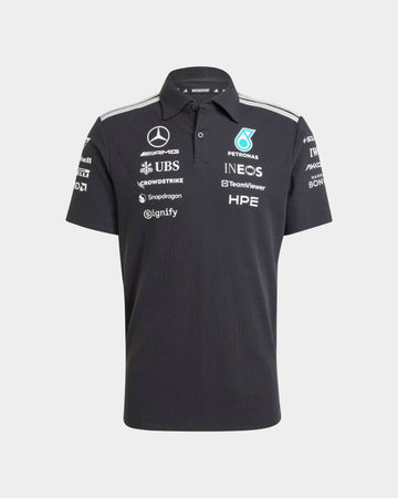 Black F1 inspired motorsport polo shirt on model with racing team graphics