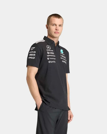 Black F1 inspired racing polo shirt front view with motorsport graphics