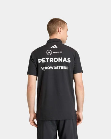 Back view of black motorsport polo shirt with racing inspired team graphics