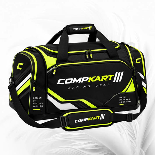 Black and neon yellow CompKart racing duffel bag with white and yellow branding, shown on a light gray background.