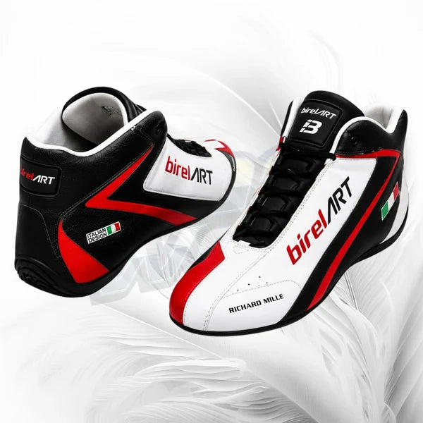 Pair of black, white, and red racing shoes with 'Birel Art' branding on a white background.
