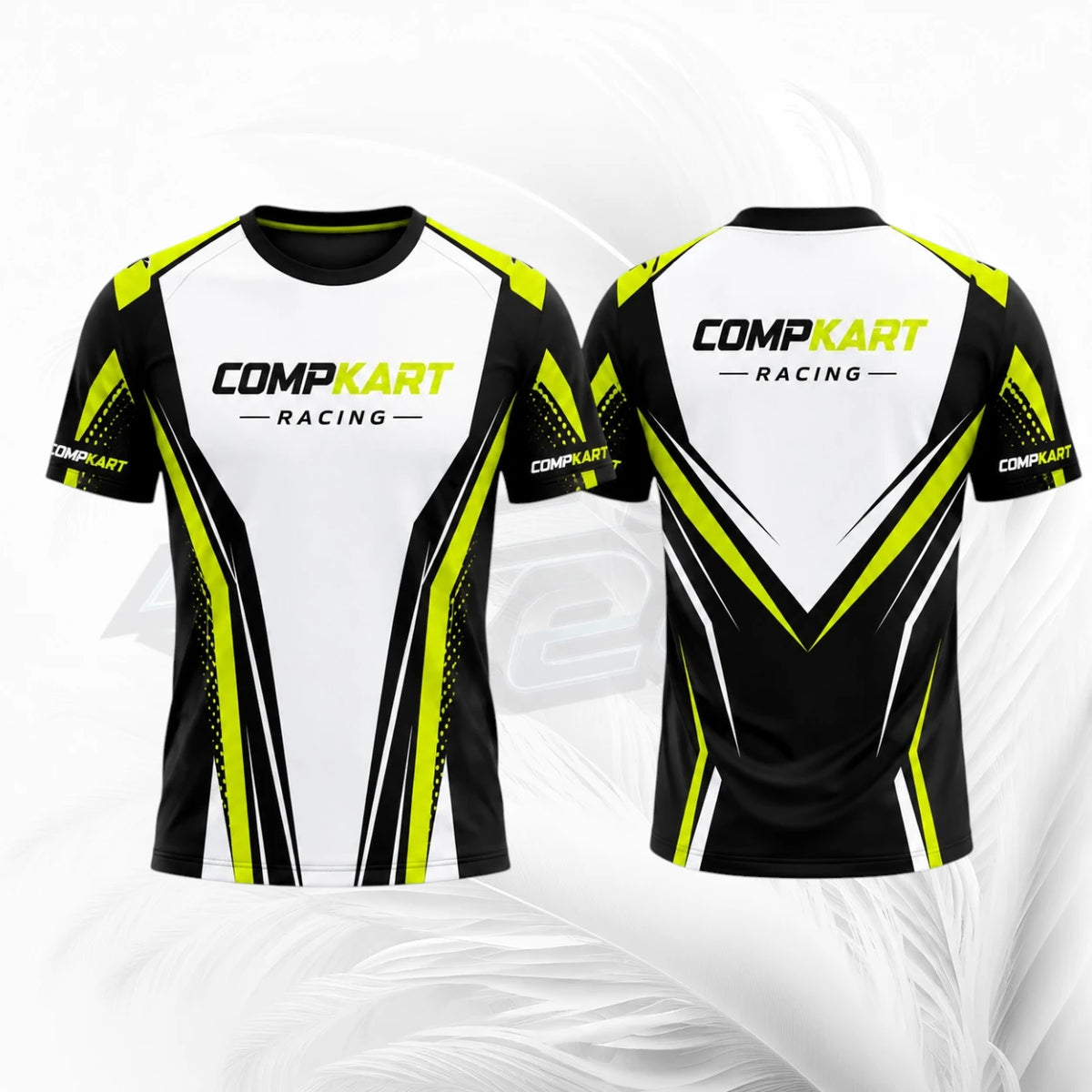 Front and back views of a short-sleeve athletic jersey with a white, black, and neon yellow design. The front features the text 'COMPKART RACING' across the chest, and the back features a large V-shaped graphic with the same branding.